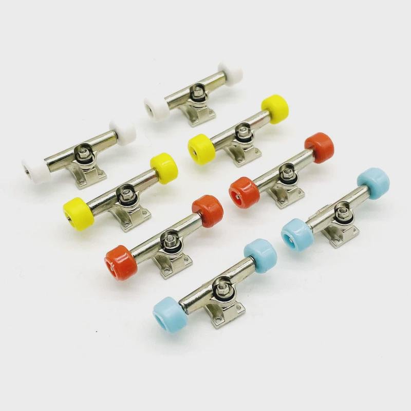 A silver-coloured nickel-plating stub fitting for the finger skater bridge, multi-colored bearing wheel-pumping nut part of the wheel hand