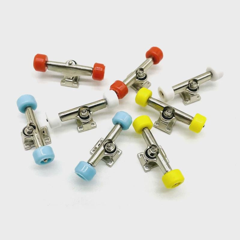 A silver-coloured nickel-plating stub fitting for the finger skater bridge, multi-colored bearing wheel-pumping nut part of the wheel hand