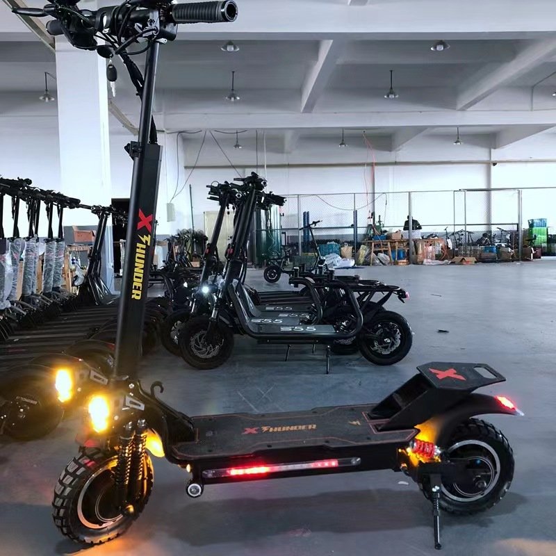 China 10 inch Pro 30mph foldable off road skateboard electric scooter 500w 2000w shock observer e scooter 100 km