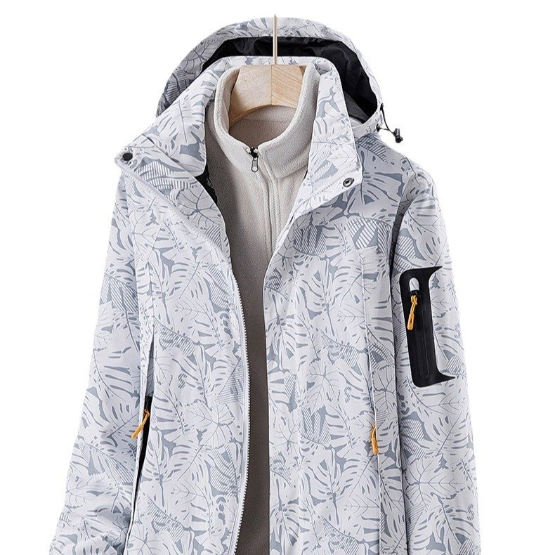 Two pairs of men and women in and out of winter, wind and water-proof-up-and-dry-dwelling-up-and-ski suits