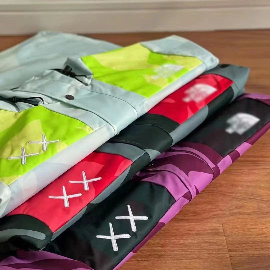 KAWS CO-NAME 1986 COMBINES A WATERPROOF, OUTDOOR ASSAULT SUIT FOR SKIING IN THE MOUNTAINS WITH A SKATING JACKET FOR MEN AND WOMEN