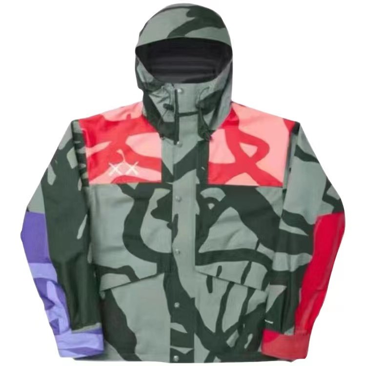 KAWS CO-NAME 1986 COMBINES A WATERPROOF, OUTDOOR ASSAULT SUIT FOR SKIING IN THE MOUNTAINS WITH A SKATING JACKET FOR MEN AND WOMEN