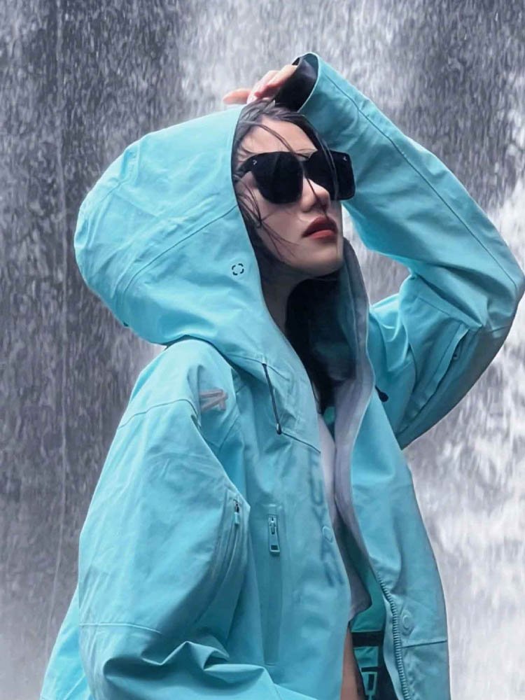 HALSIDE, THE BLUE SCOOTER COAT GIRL, THREE-AND-A-HALF-A-WINDY, WATERPROOF COUPLE SKIS