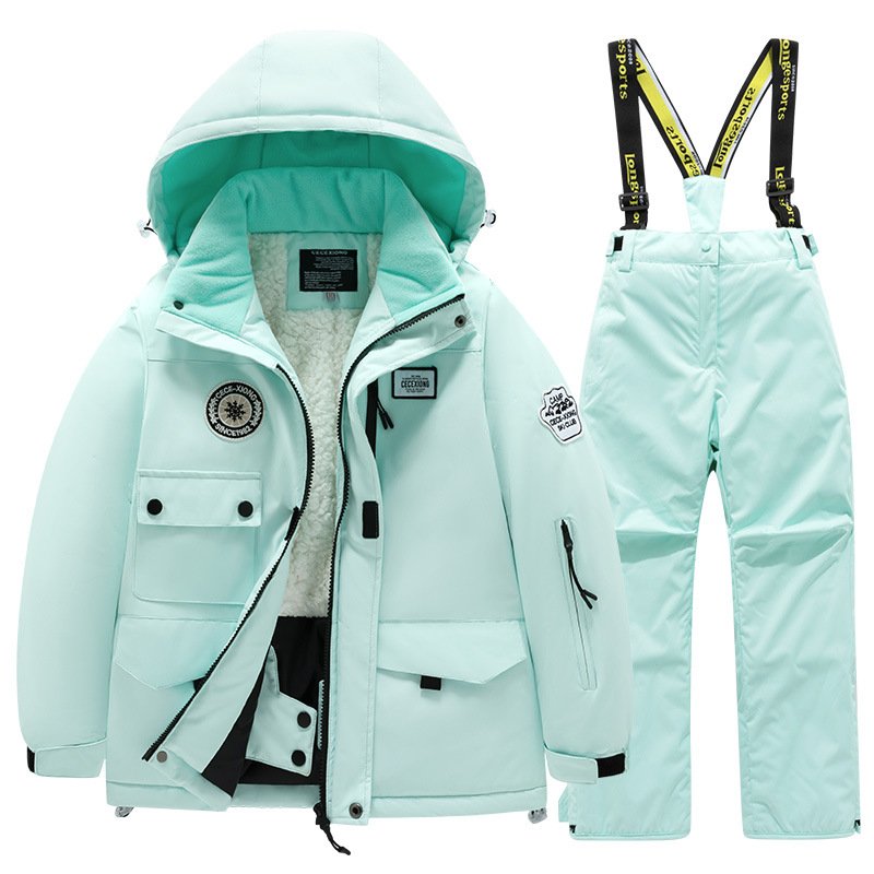 New set of two-skinned snowboards for a new winter season for boys and girls in child skis
