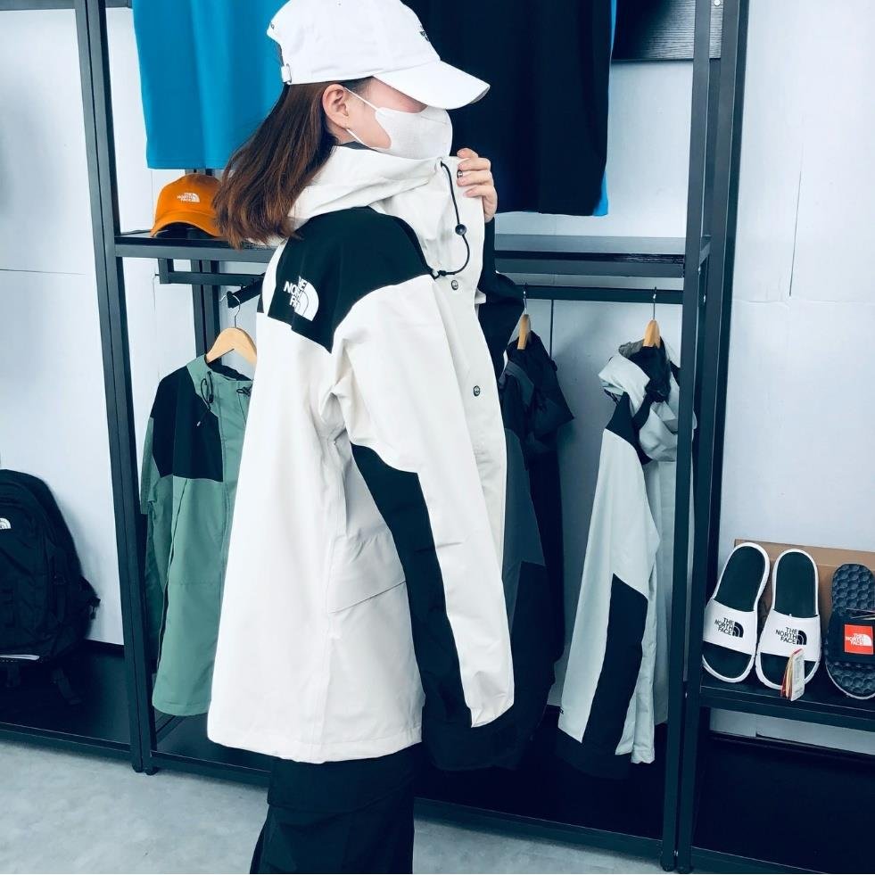 A new, 2024, water-resistant, wind-proof, snowboarding camping suit for couples