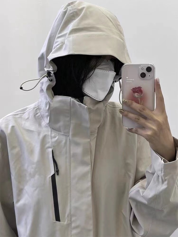 IN TIBET, NASA TRAVELS THREE TIMES A MAN AND A WOMAN, AND WIND AND WATERPROOFS THEM
