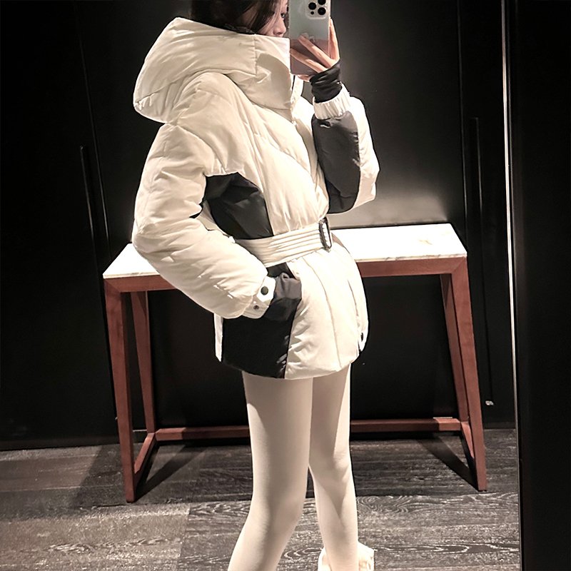 Black-and-white-coloured, warm-and-skinned coat girl
