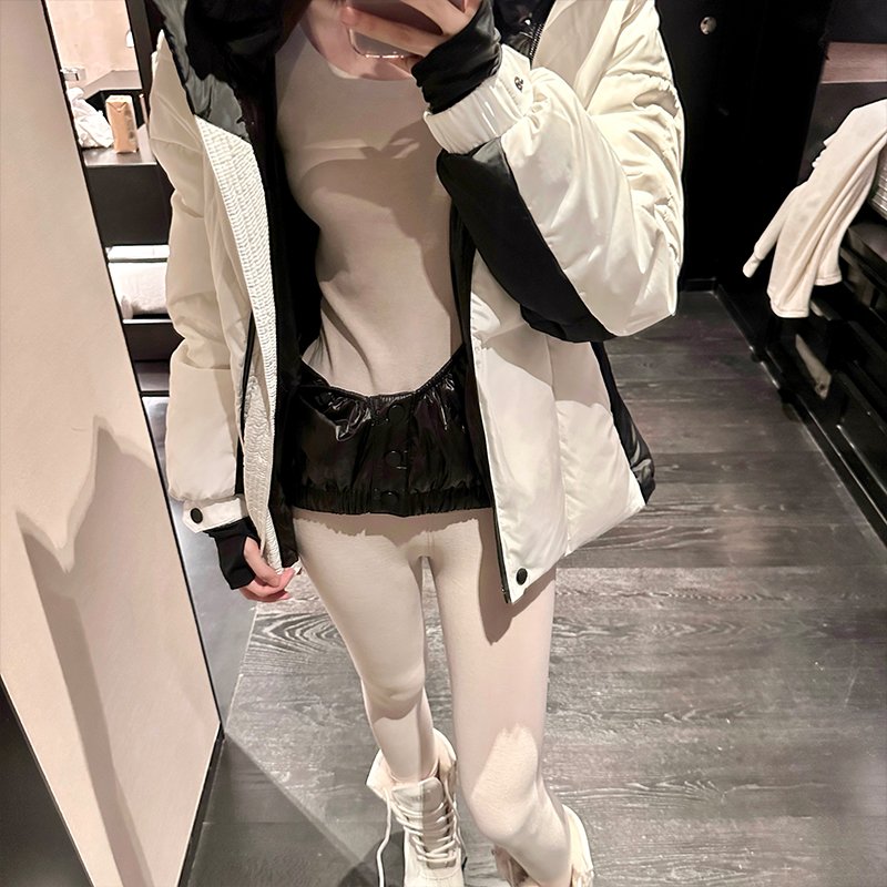 Black-and-white-coloured, warm-and-skinned coat girl