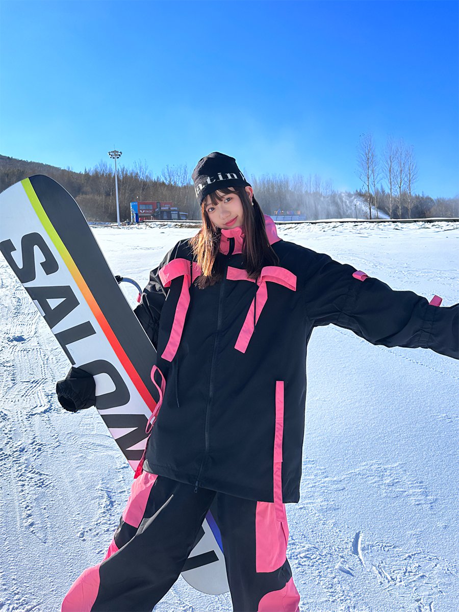 k-skigirls with a professional snow-skinpants jacket, scrambling the water-proof, wind-proof top of winter