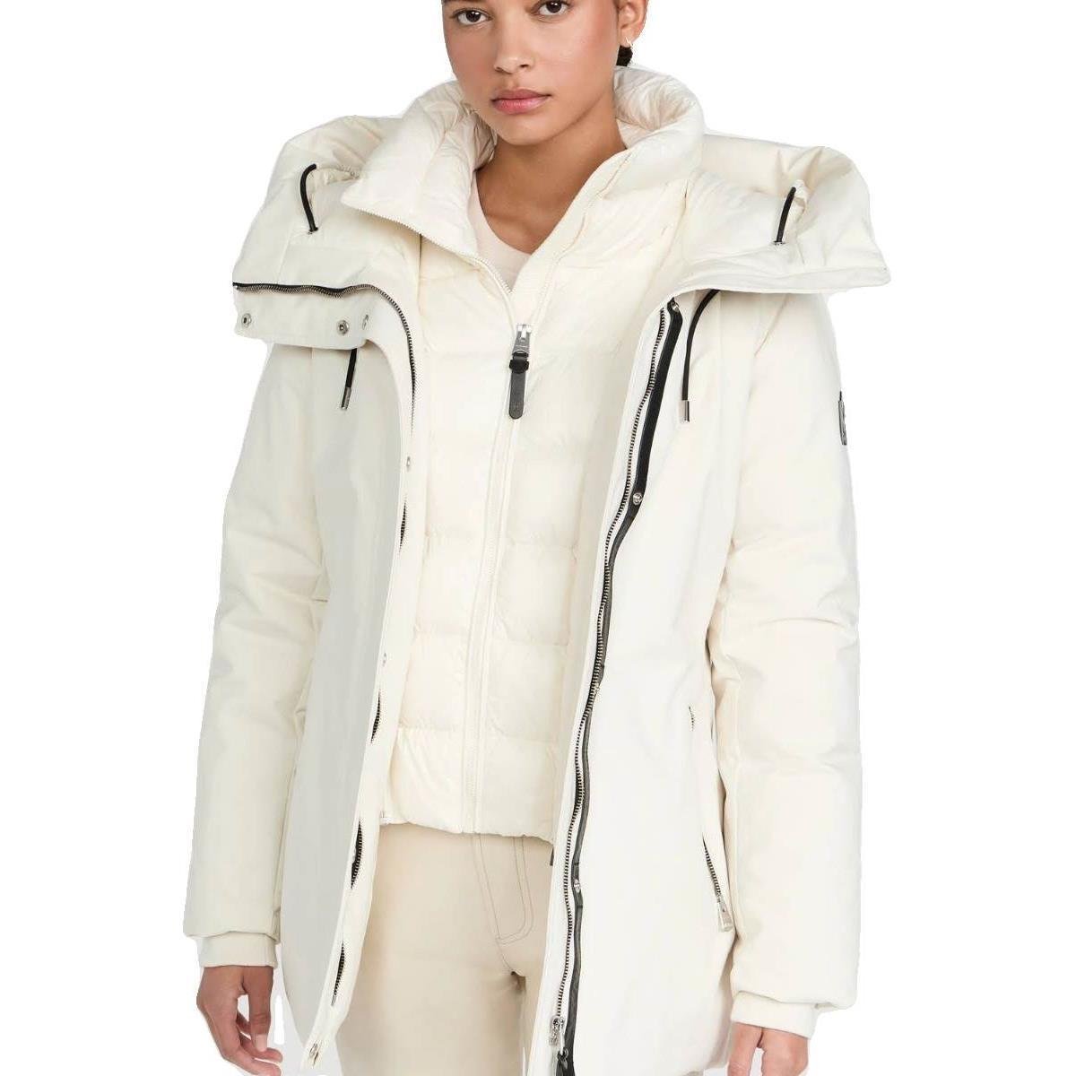 A new Mackage Goose-By Hat, two belt-free skiing feathers