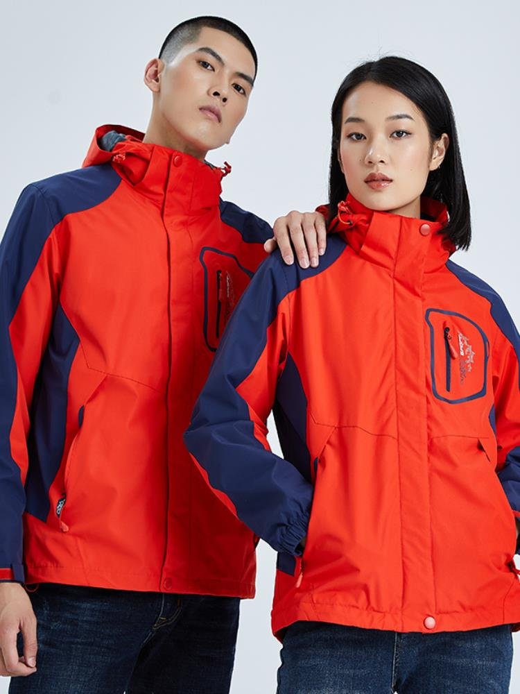 A man and a woman in Jordan's winter exterior assault suit three times a wind and waterproof and thicker to remove two pieces