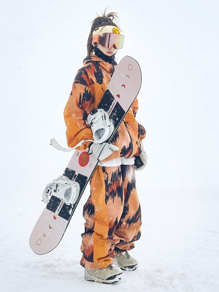 nowinsnow skisuits with a man and a woman in a waterproof scooter coat