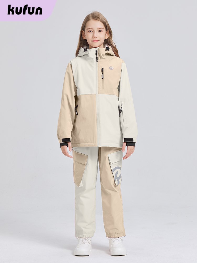 A new 2023 for a kid in a hot-frozen ski suit