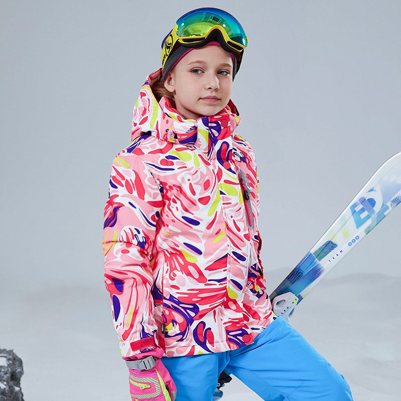 A pair of cold ski pants for boys and girls in winter skis