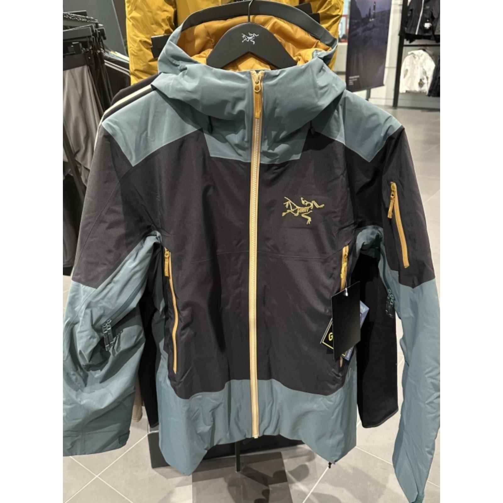 ARC'TERYX ORIGINAL MALE AND FEMALE SABRE LTARSV WINDPROOF HUSKS AND COTTON SKIS