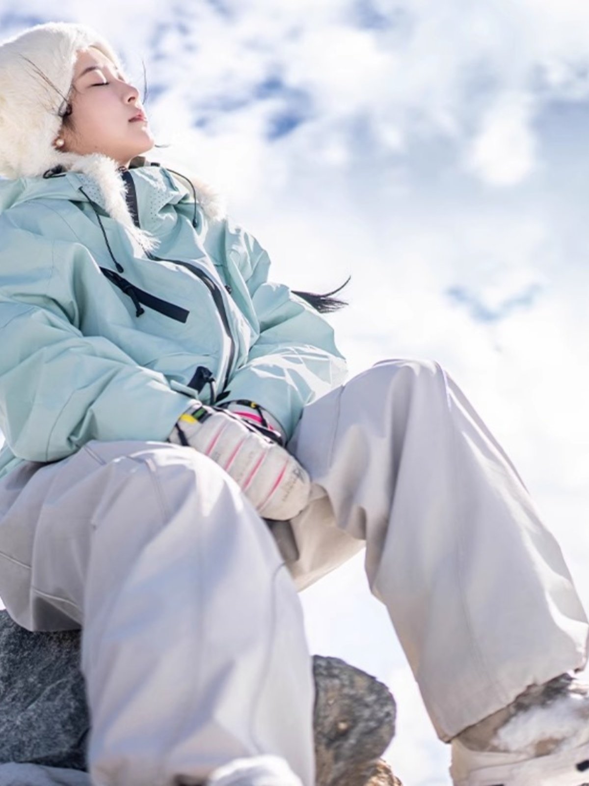Italian ski couple dopamine outside the autumn and winter, wearing a ski jacket to get to the top of the mountain