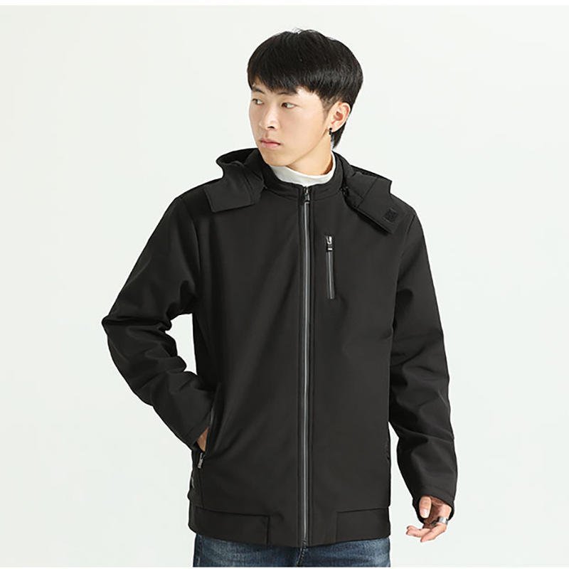 The man with the hot coats and the long sleeves of the hot and warm coats outside of his winter scooter