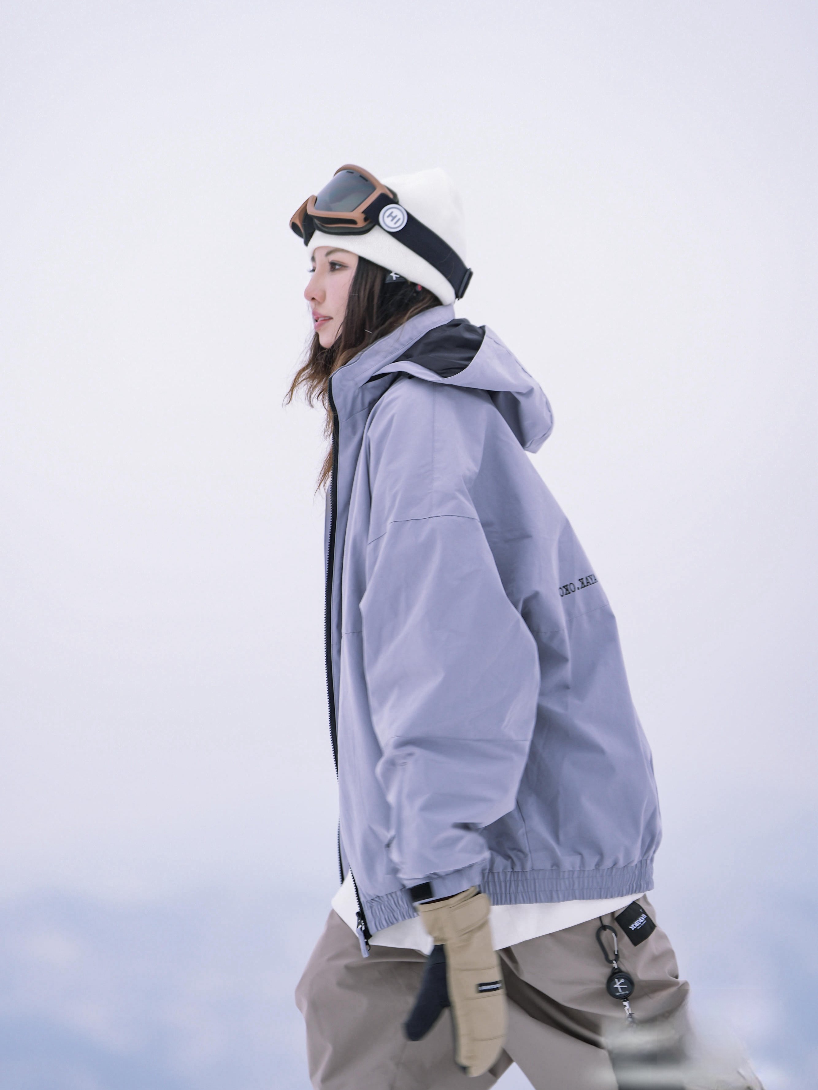 Yokkaya smooth ski suit coats warm men and women with thick hats to fold to hide waterproof wind collars