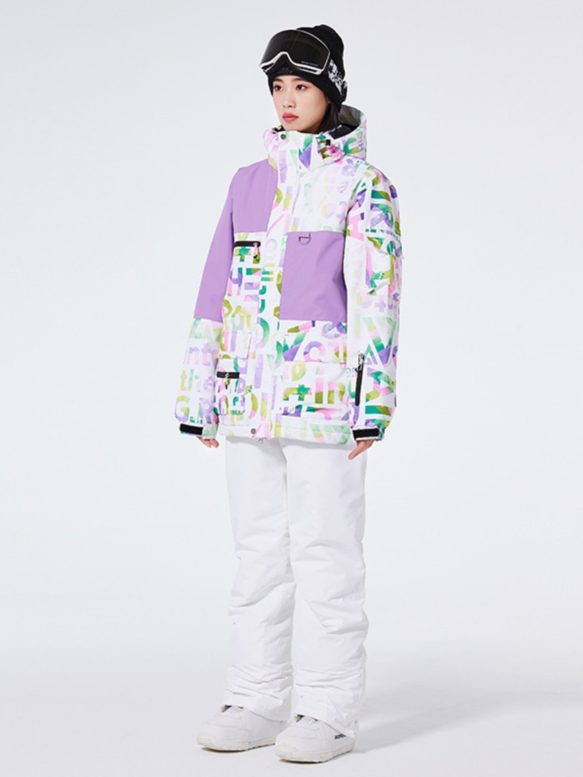 One-board ski suit for a lady in an outdoor ski and waterproof coat for the winter