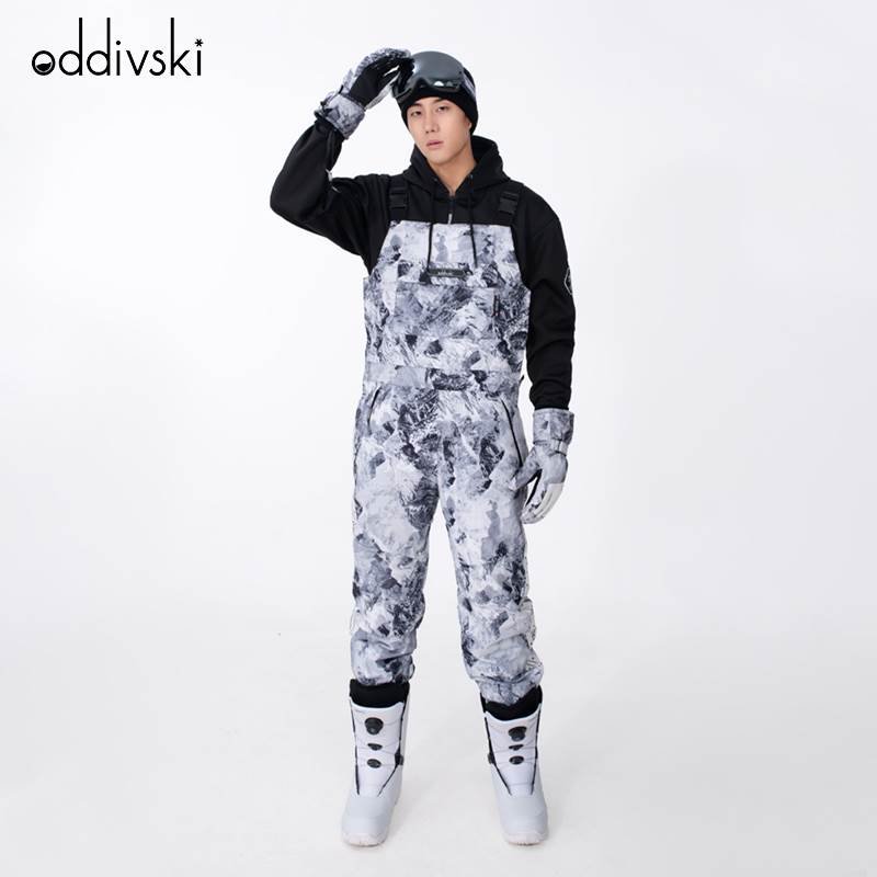 A new ski suit for a man with an outdoor windproof water and a thick warm ski suit with a single two-board ski kit