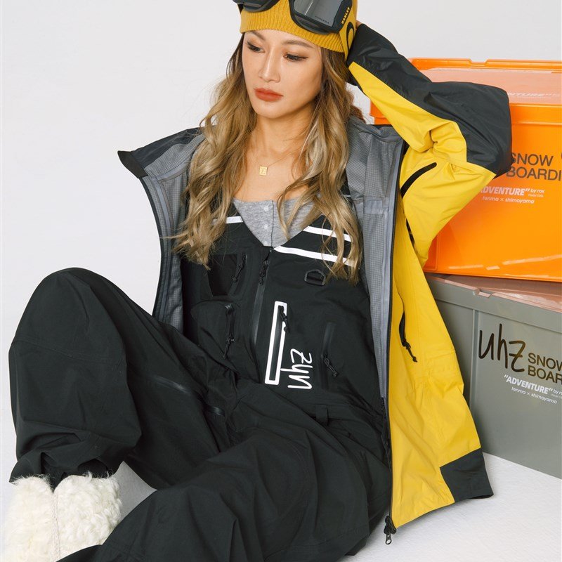 Ms. Uhz, the man with the hat, a single, double-skinned ski suit