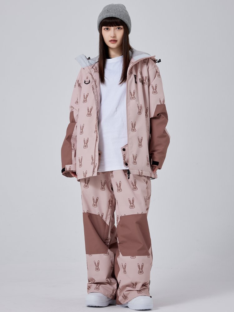 A new 2023 ski suit for a woman with a two-board, single-board, red-tweet ski pants