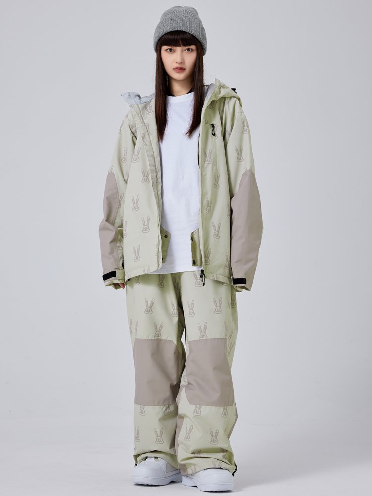 A new 2023 ski suit for a woman with a two-board, single-board, red-tweet ski pants