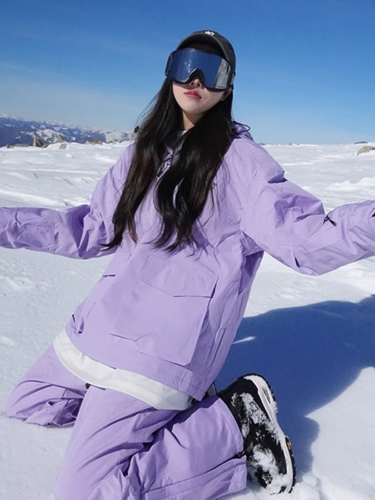 The Italian ski suit, the man and the woman who paid for the heat, the one-board, loose coat, the two-board ski suit