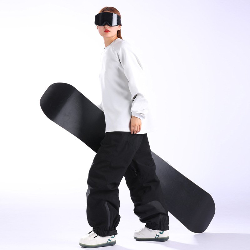 New ski pants for a woman with a thick belt and a cotton warmer
