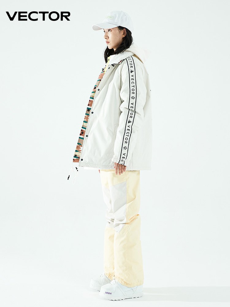 VECTOR PLAYS THE TWO-FACED SKI JACKET AND SKI PANTS OUTSIDE OF THE ROOM