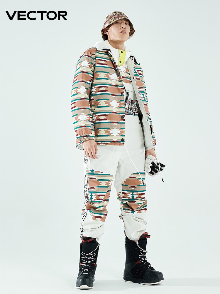 VECTOR PLAYS THE TWO-FACED SKI JACKET AND SKI PANTS OUTSIDE OF THE ROOM