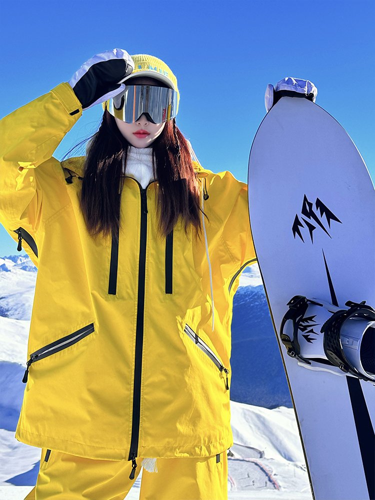 ZACHARIAH. LEMON-YELLOW SKI SUIT FOR WOMEN IN WIND AND WATER-PROOF SKIS