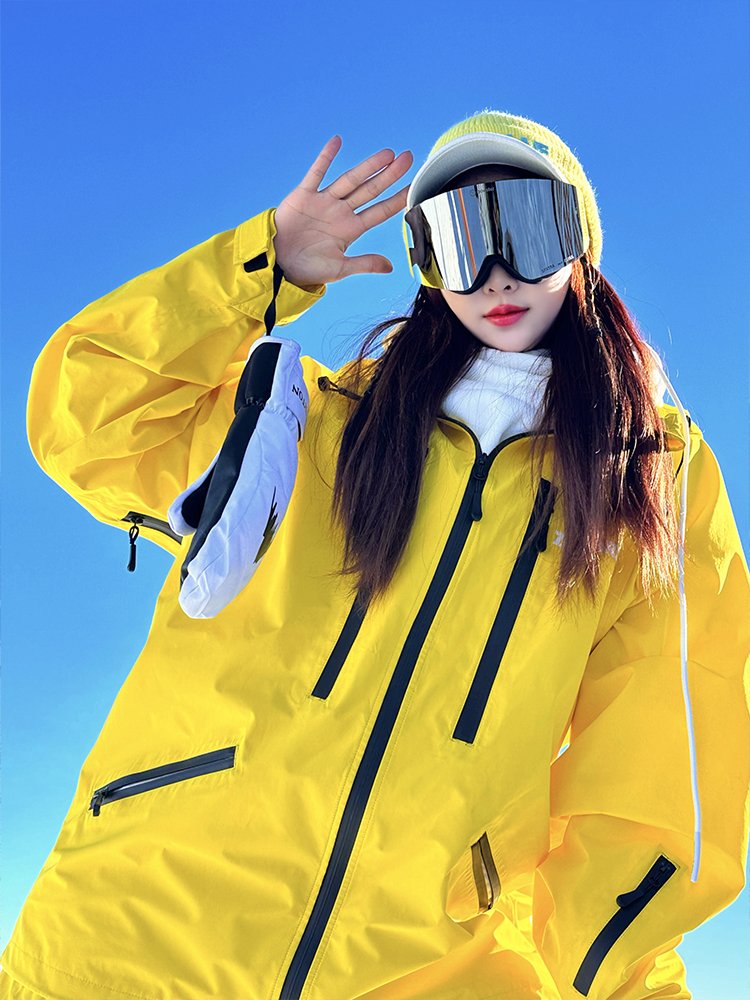 ZACHARIAH. LEMON-YELLOW SKI SUIT FOR WOMEN IN WIND AND WATER-PROOF SKIS