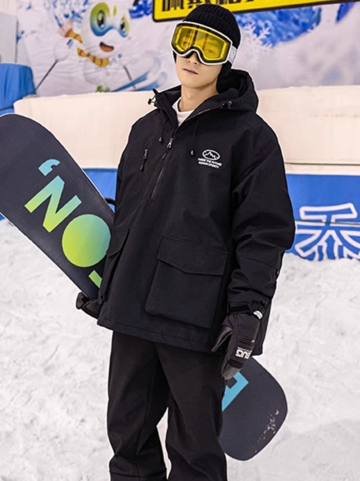 An outdoor ski suit, a man and a woman with a single, loose coat with a pair of ski pants