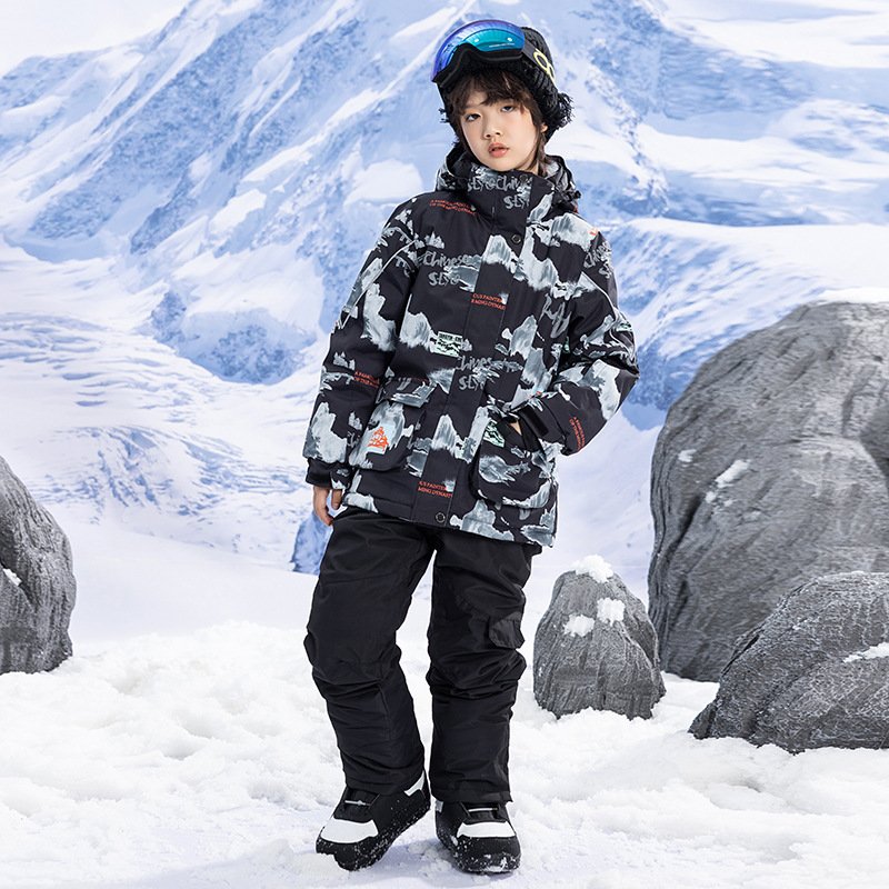 New clothes for children in ski suits for girls in winter weather-proof and water-proof and thick ski pants