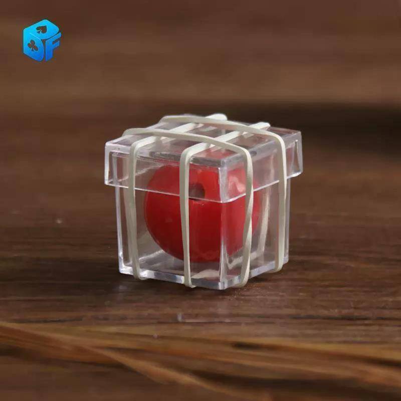 The new northern magic copper wall iron wall small ball crosses the transparent box, penetrates the wall into the room children's toys close -up magic