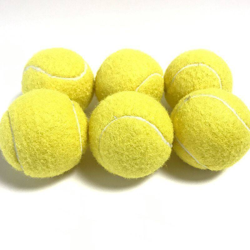 Six yellow tennis balls