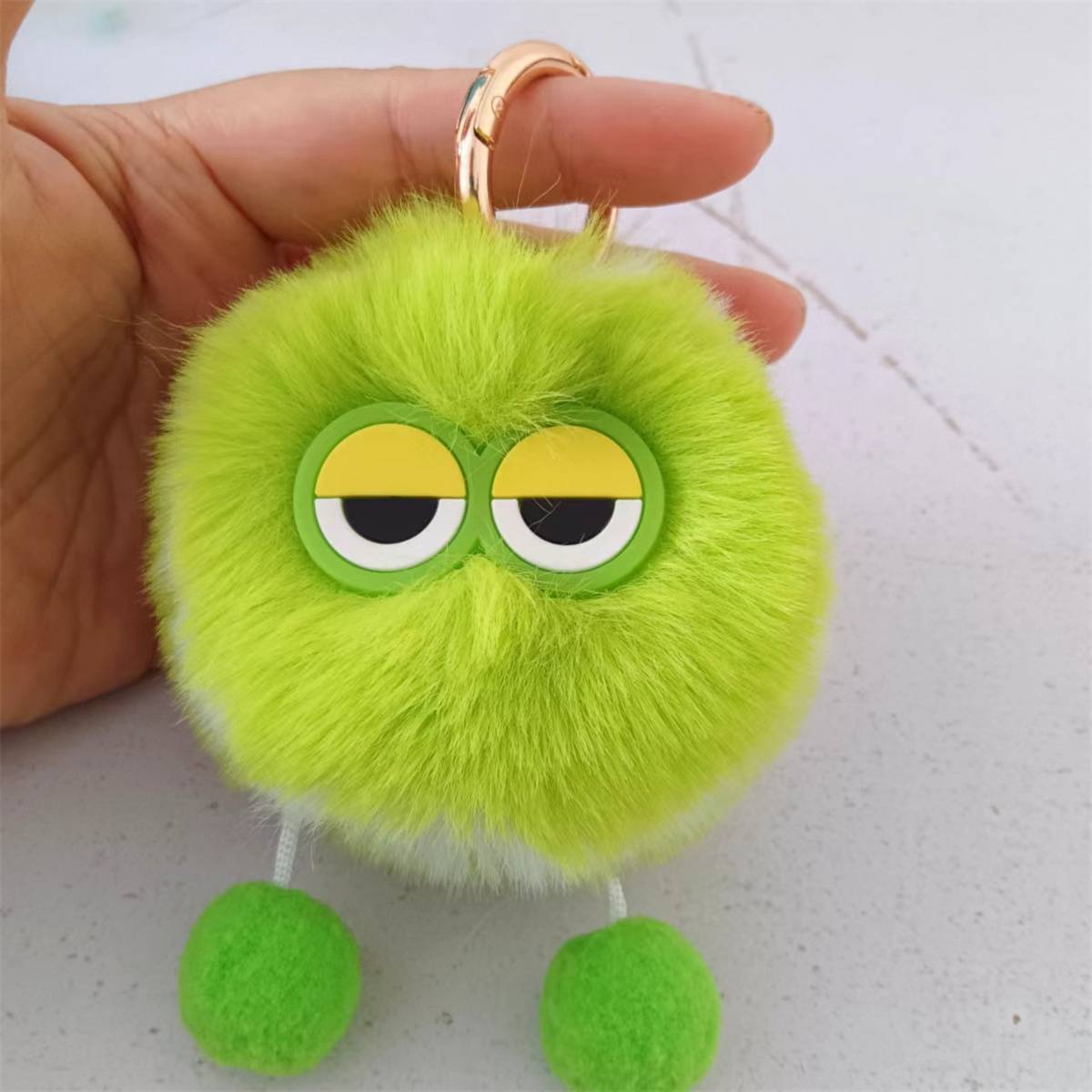 Cute little tennis imitation otter rabbit hair keychain plush ball bag hanging decorative plush mobile phone accessories tennis pendant