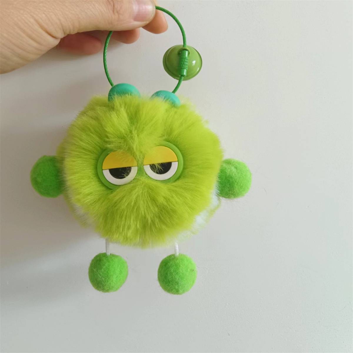 Cute little tennis imitation otter rabbit hair keychain plush ball bag hanging decorative plush mobile phone accessories tennis pendant