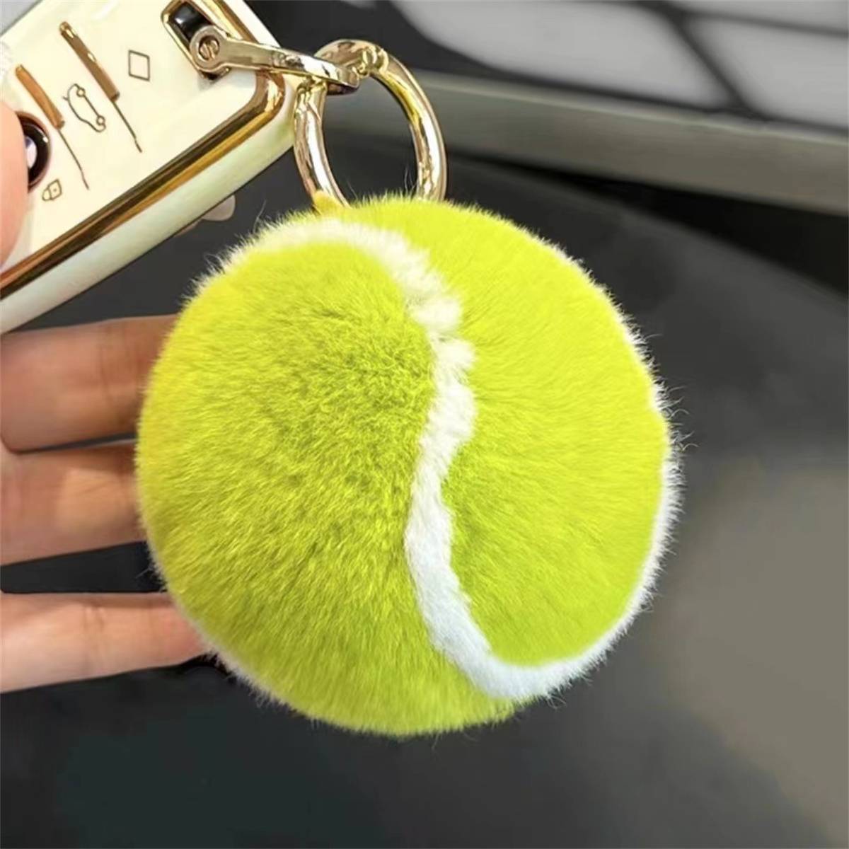Cute little tennis imitation otter rabbit hair keychain plush ball bag hanging decorative plush mobile phone accessories tennis pendant