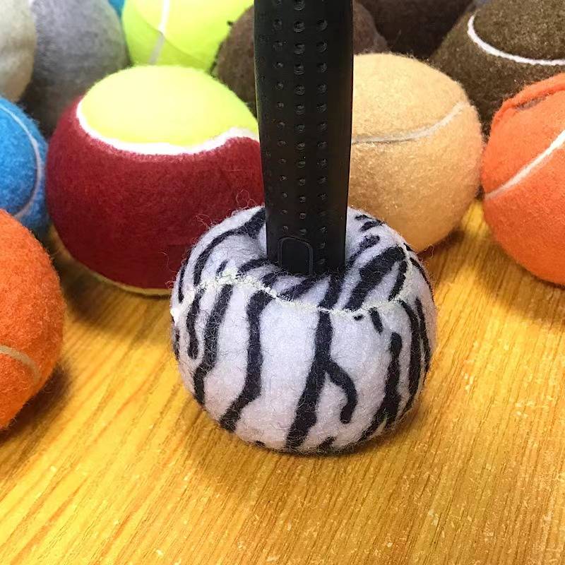 Zebra cross-cut tennis ball four