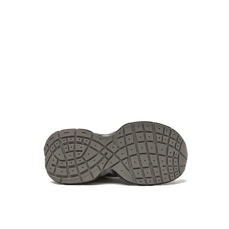 A man's summer shoe net to his father's shoe is a man's shoe, a man's sneaker, a man's shoe