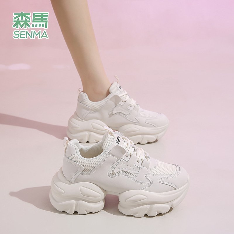 Samma's old white bear's shoe girl, 2024, a new web-enabled recreational shoe, aired up and small