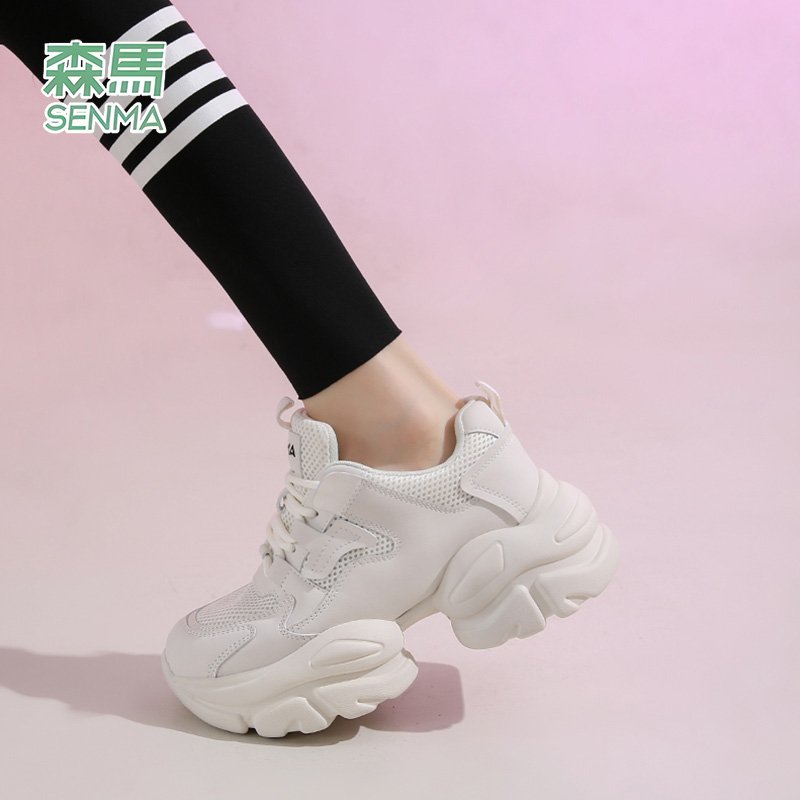 Samma's old white bear's shoe girl, 2024, a new web-enabled recreational shoe, aired up and small