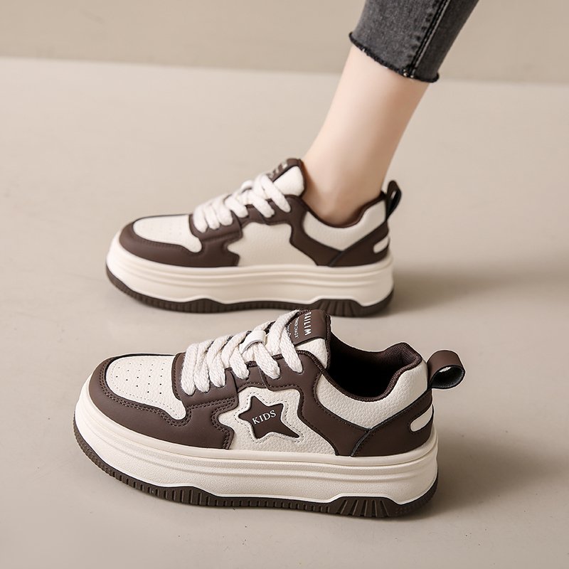 Little white-shoe girl with small feet in the spring of 2024