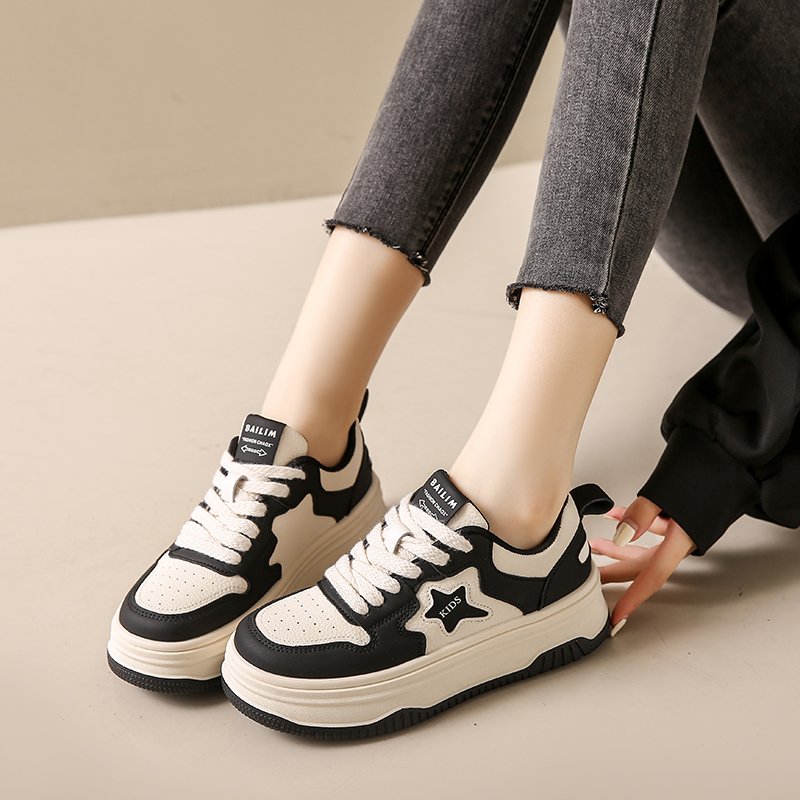 Little white-shoe girl with small feet in the spring of 2024