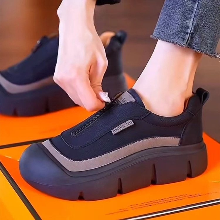 She's wearing a big, fat, fat-footed sneaker in 2024