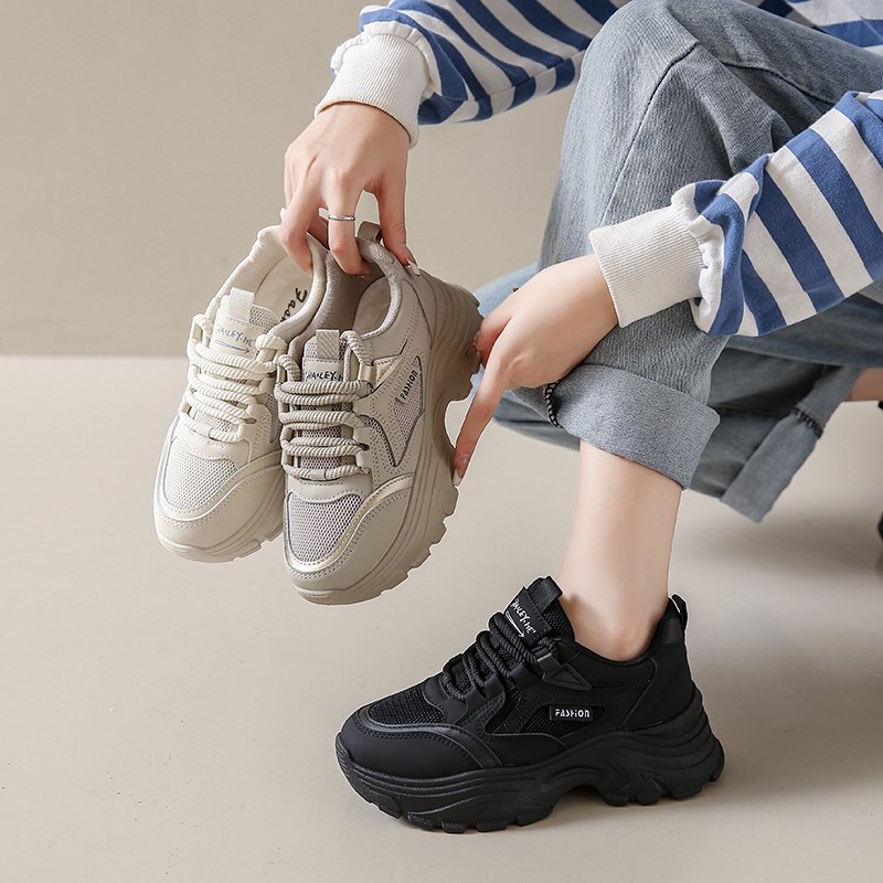 Black sneakers stomping on the shit in the spring