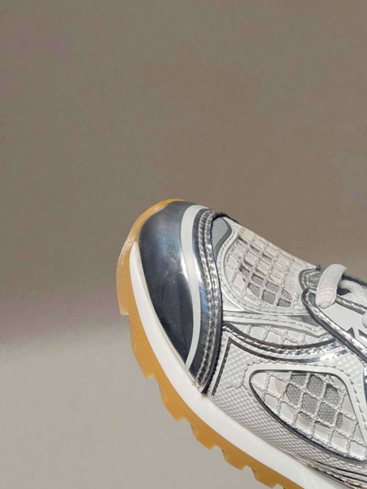 Wang's one-and-a-half silver sneakers