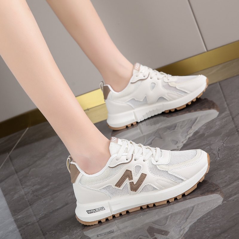A girl's shoe stomping on the net, a girl's air-smuggled sneakers